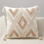 taies d'oreiller géométriques brodées contemporaines beige gris blanc pompons respectueux environnement