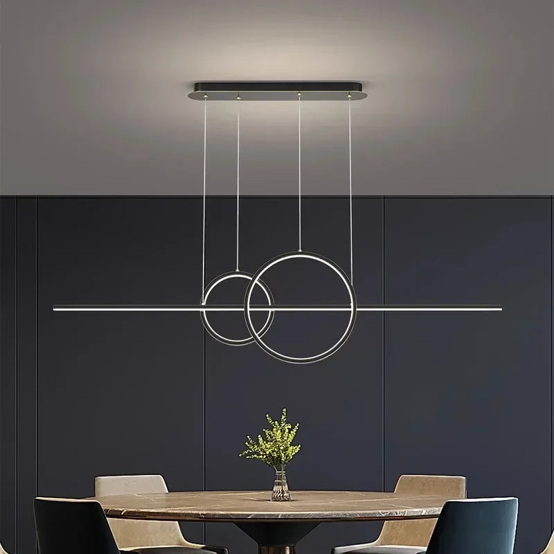 suspension lumineuse moderne or noir minimaliste câbles suspendus panneaux texturés