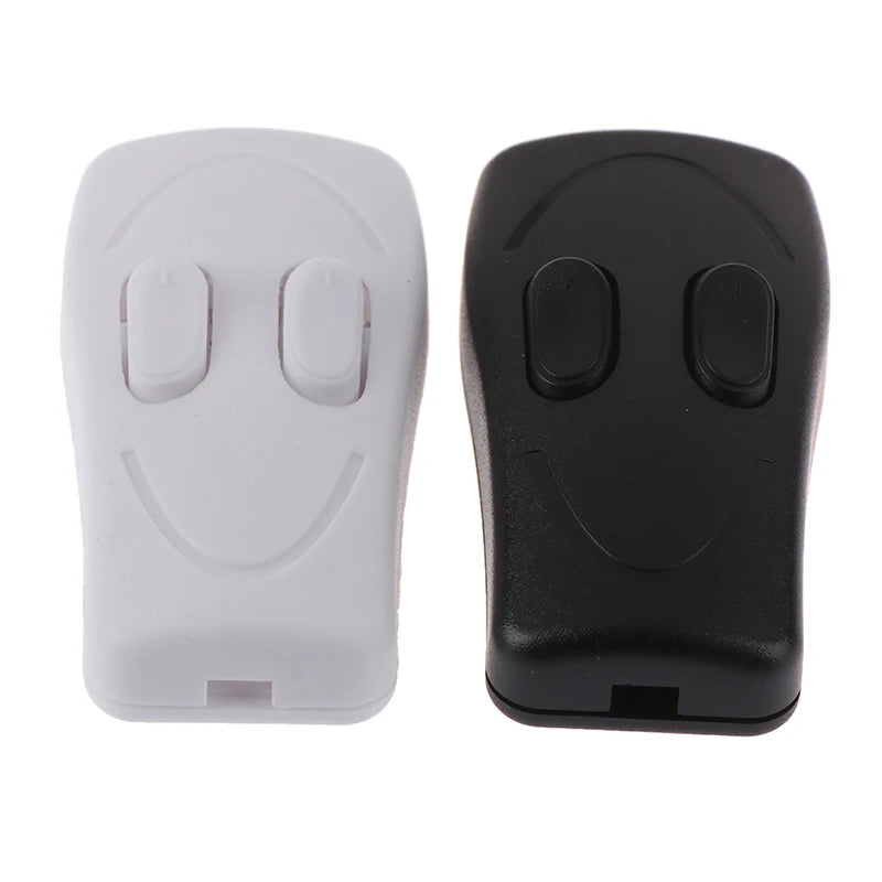 télécommande moderne sourire noir blanc commande bouton poussoir haute tension