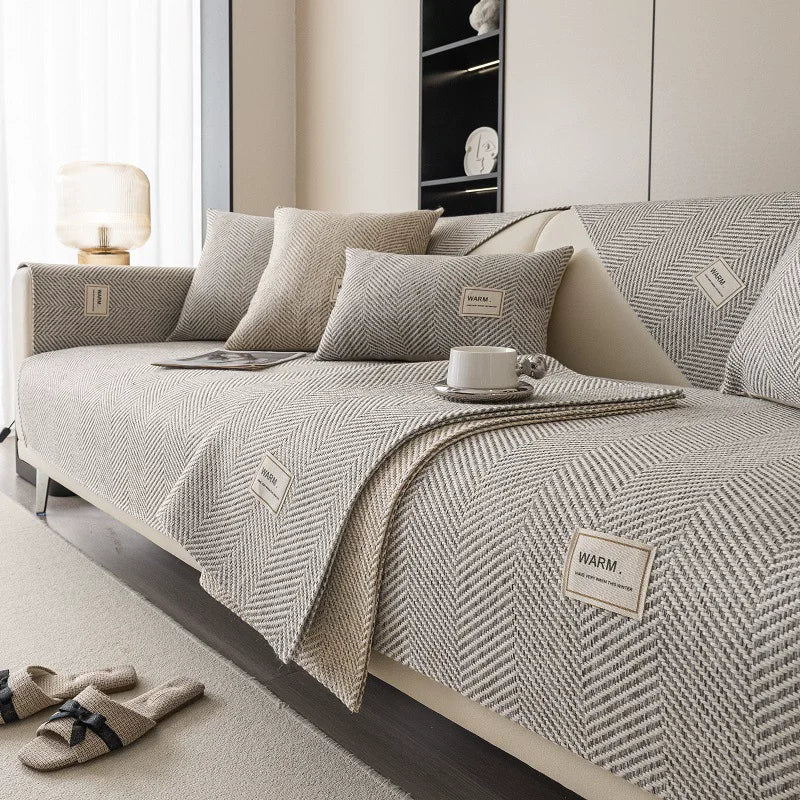 coussin canapé gris clair beige motif herringbone moderne antidérapant fixations œilletsétalement winternaletéquiper salon