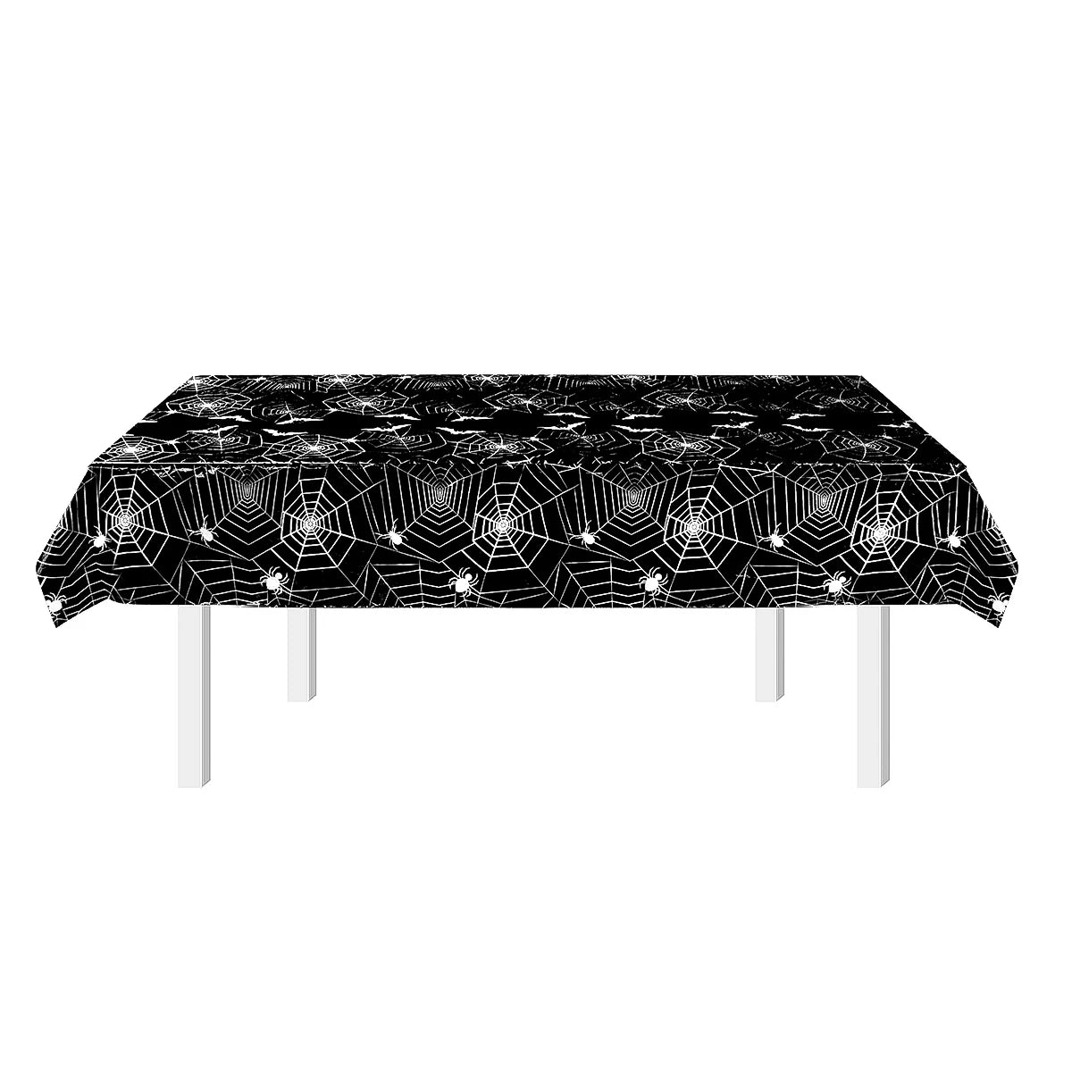 assiettes halloween araignées verres serviettes table noire blanc points brillants toile festive octobre