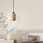 suspension lumineuse moderne pierre texture granulée gris beige noir éclairage ambiance chambre salonhôtel