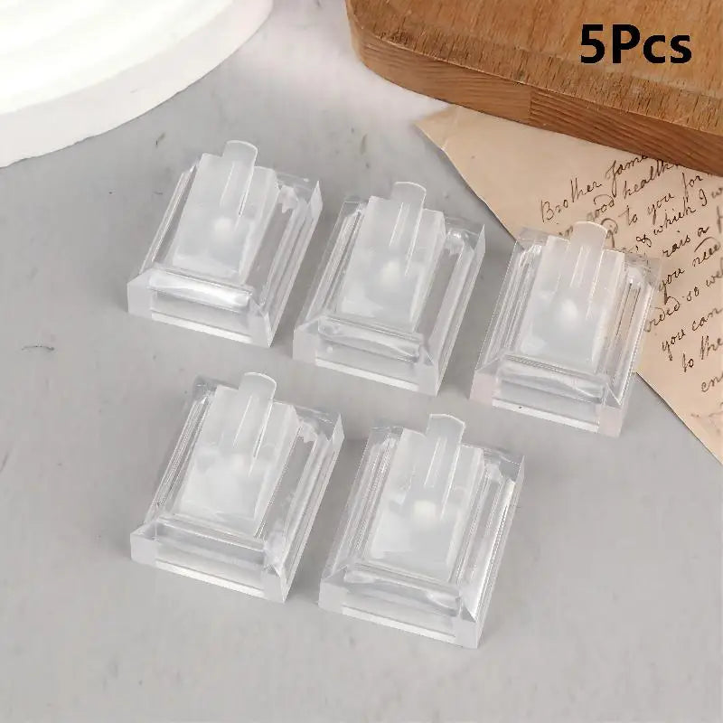 supports bijoux transparents blancs noirs clips modernes minimalistes rangement affichage bagues stockage