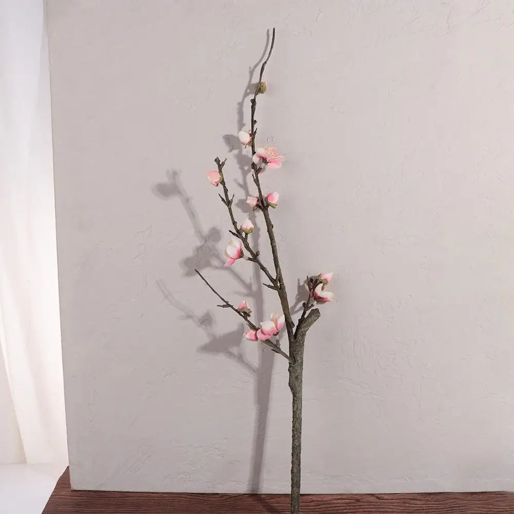 décoration intérieure bouquet fleurs prunier artificielles rose blanches vase transparent minimaliste asian