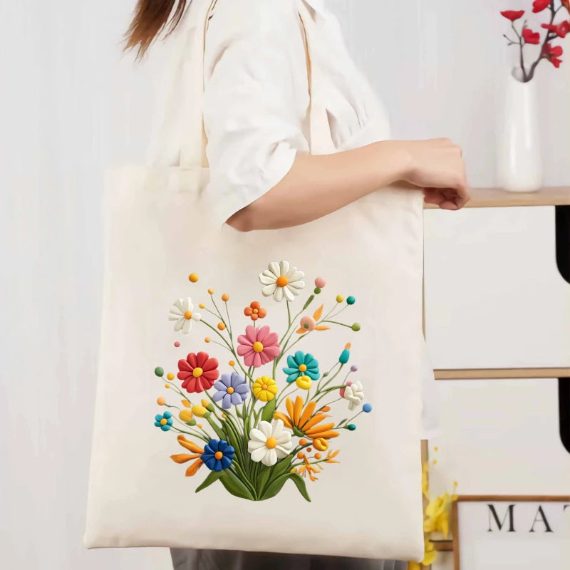 sac main toile fleurs colorées beige respectueux environnement réutilisable poignées tissu motifs imprimés multi