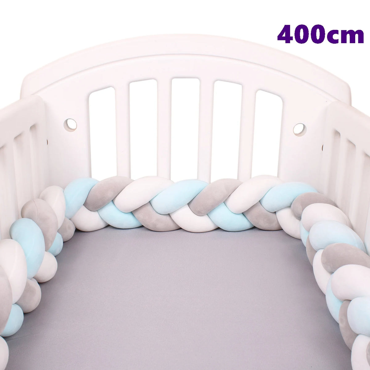 coussin noué bébé tissu doux texture tressée beige clair moderne confortable sécurité chambre anti