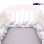 coussin noué bébé tissu doux texture tressée beige clair moderne confortable sécurité chambre anti