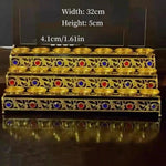 support bougies doré orné pierres semi précieuses motifs floraux artisanal traditionnel bouddhiste cologne française