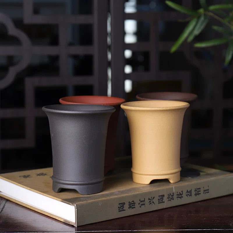 Cache pots céramique sculpté main classique gris foncé plante verte intérieur extérieur decoration jardin
