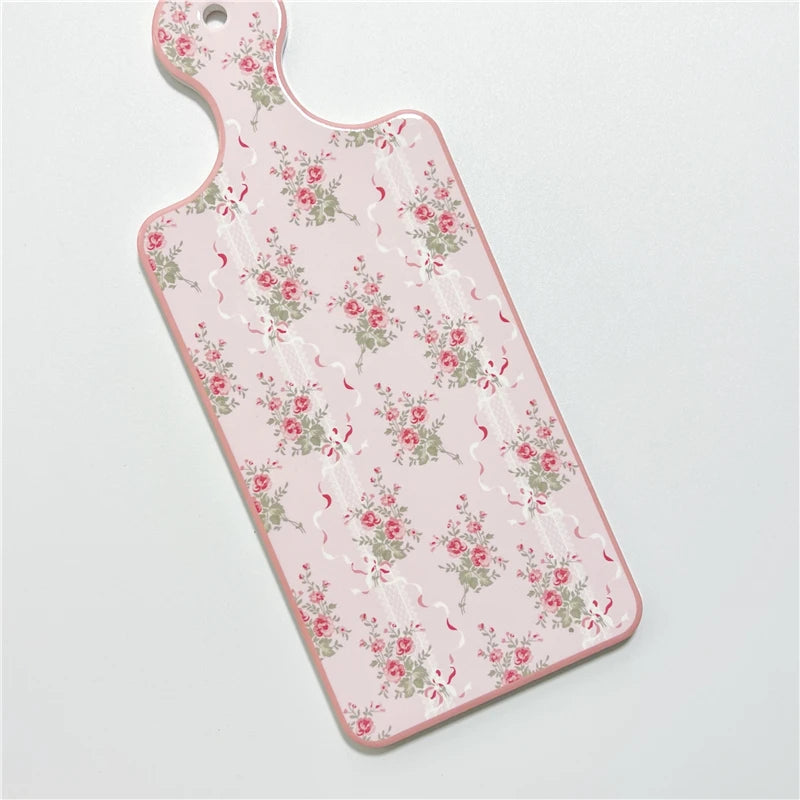 planche découper céramique vintage fleurs roses motifs géométriques blanc roseclair