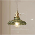suspension lumineuse vintage vert doré motifs géométriques ampoules câbles chaînes métal