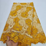 tissu dentelle brodée sequins dorés florals jaune vert rose rouge translucent traditionnel erotique echangiste