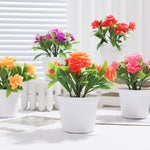 décoration intérieure moderne fleurs artificielles pots blancs feuilles vertes minimaliste exposition chambre fête