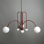lustre moderne rouge noir doré sphères blanches opaques suspension salon chambre