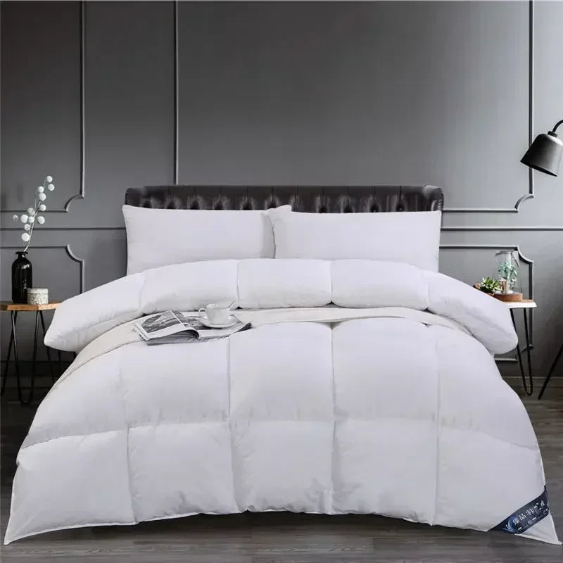 Couette pliée montrant son épaisseur pour confort optimal