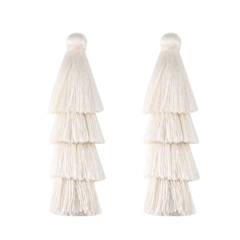 pompons franges polyester décoratifs modernes couleur bleu noir beige rose violet vert jaune blanc