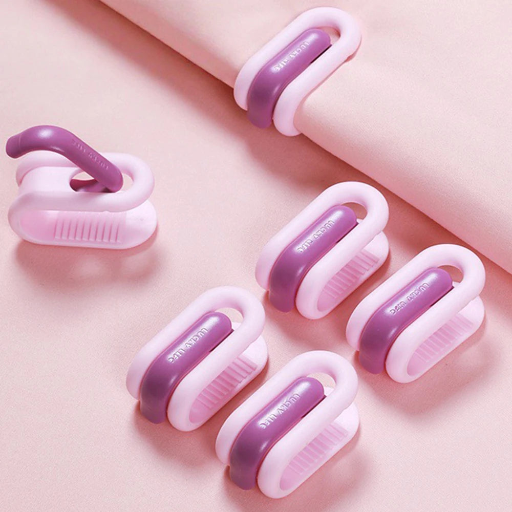 clips rangement moderne rose clair beige vert pastel violet adhésifs minimalistes pièces invisible housse