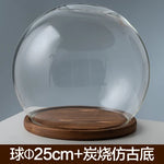 boule verre transparent socle bois décoration d'intérieur moderne objet d'exposition moderne