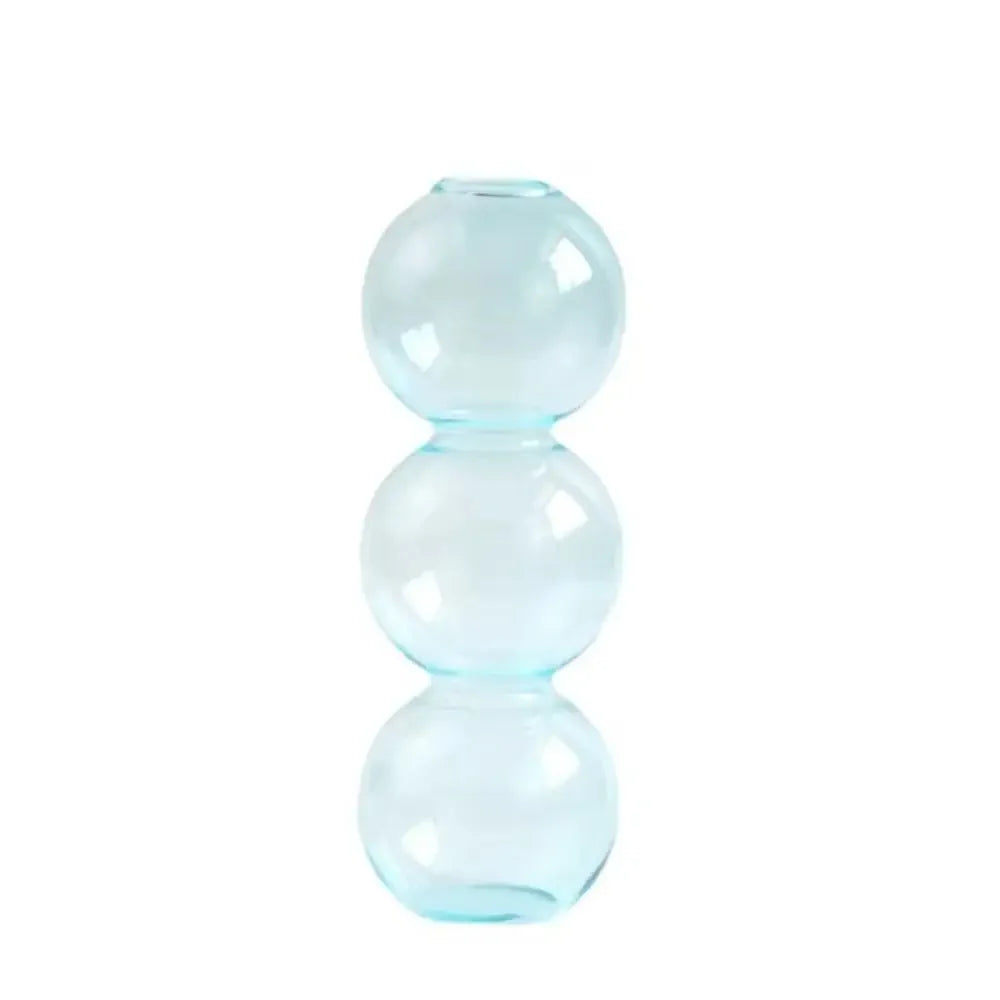 vase moderne transparent sphères empilées jaune clair rose bleu vert brun