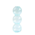vase moderne transparent sphères empilées jaune clair rose bleu vert brun