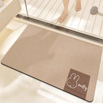 tapis bain dessin animé lapins gris jaune vert bleu rayures enfantin absorbant