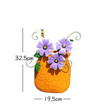 décoration murale artisanale fleurs colorées feuilles vertes abeille bleu jaune orange violet