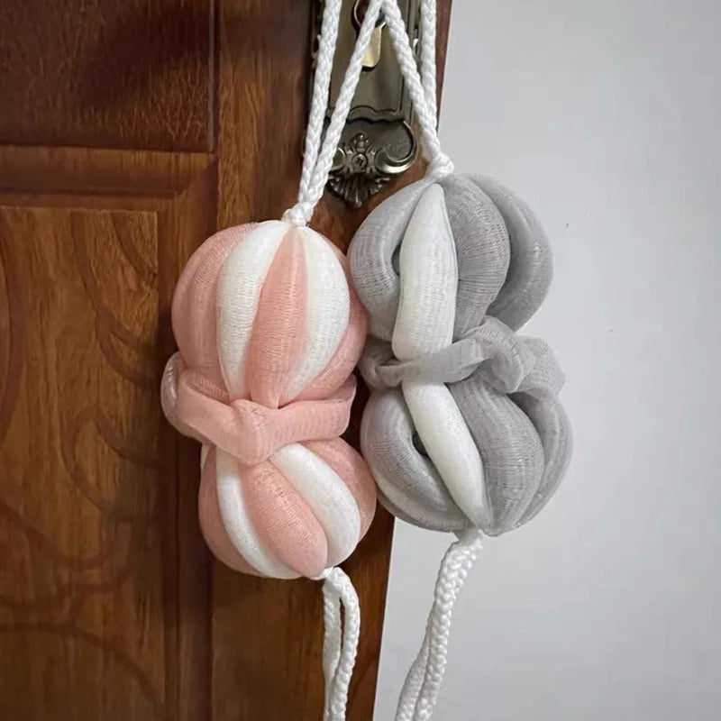 gant bain exfoliant moderne cordelette rayures horizontales beige rose gris clair