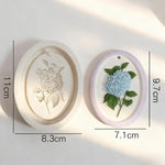 cadre décoratif ovale silicone fleurs reliefs artisanal clips ruban couleurs variées maison