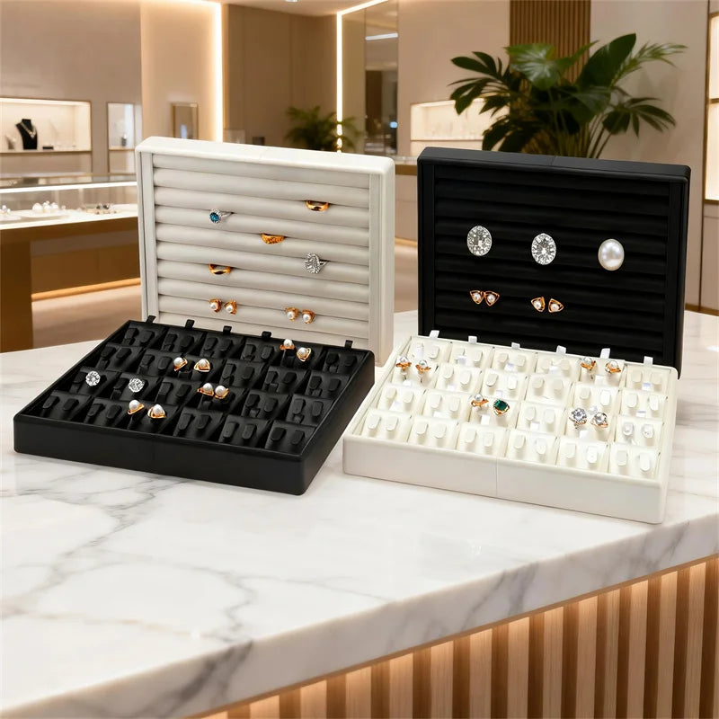 boîte bijoux cuir noir blanc plateau rangement bague boucle d'oreille organisation modernescrição