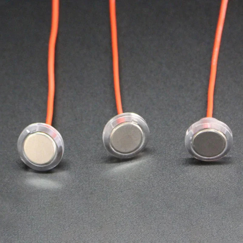 interrupteur tactile rouge fil argenté technique industriel transparent sans lampe
