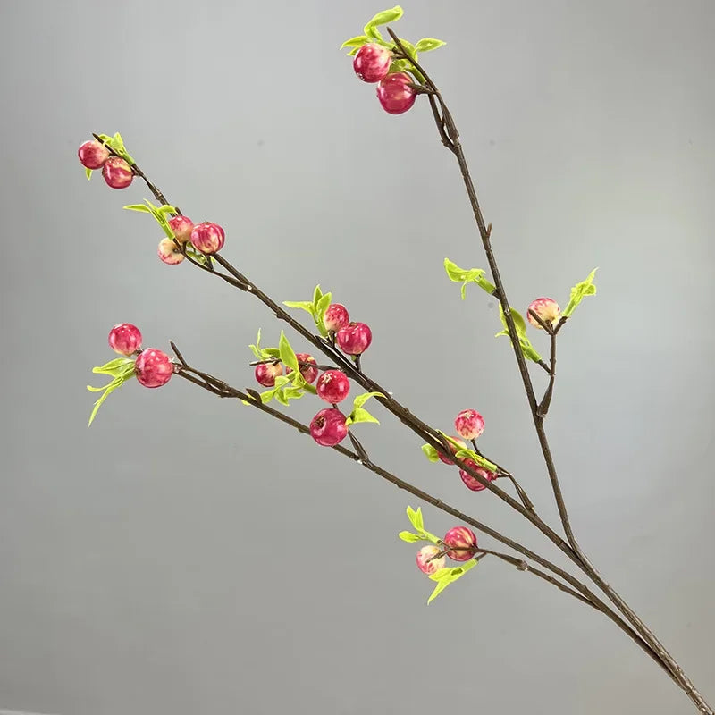 branche artificielle fleurs feuilles vert clair rouge vifextérieur décoration naturelle