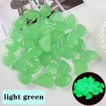 pierres fluorescentes bleu vert jaune rose modernes lisses jardin patio décor lumineux