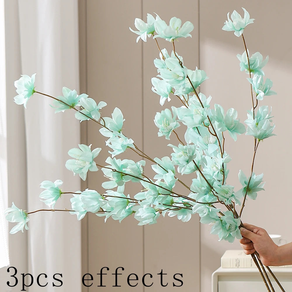 décoration intérieure bouquet fleurs artificielles rose naturel blanc orange rouge bleu vase minimaliste