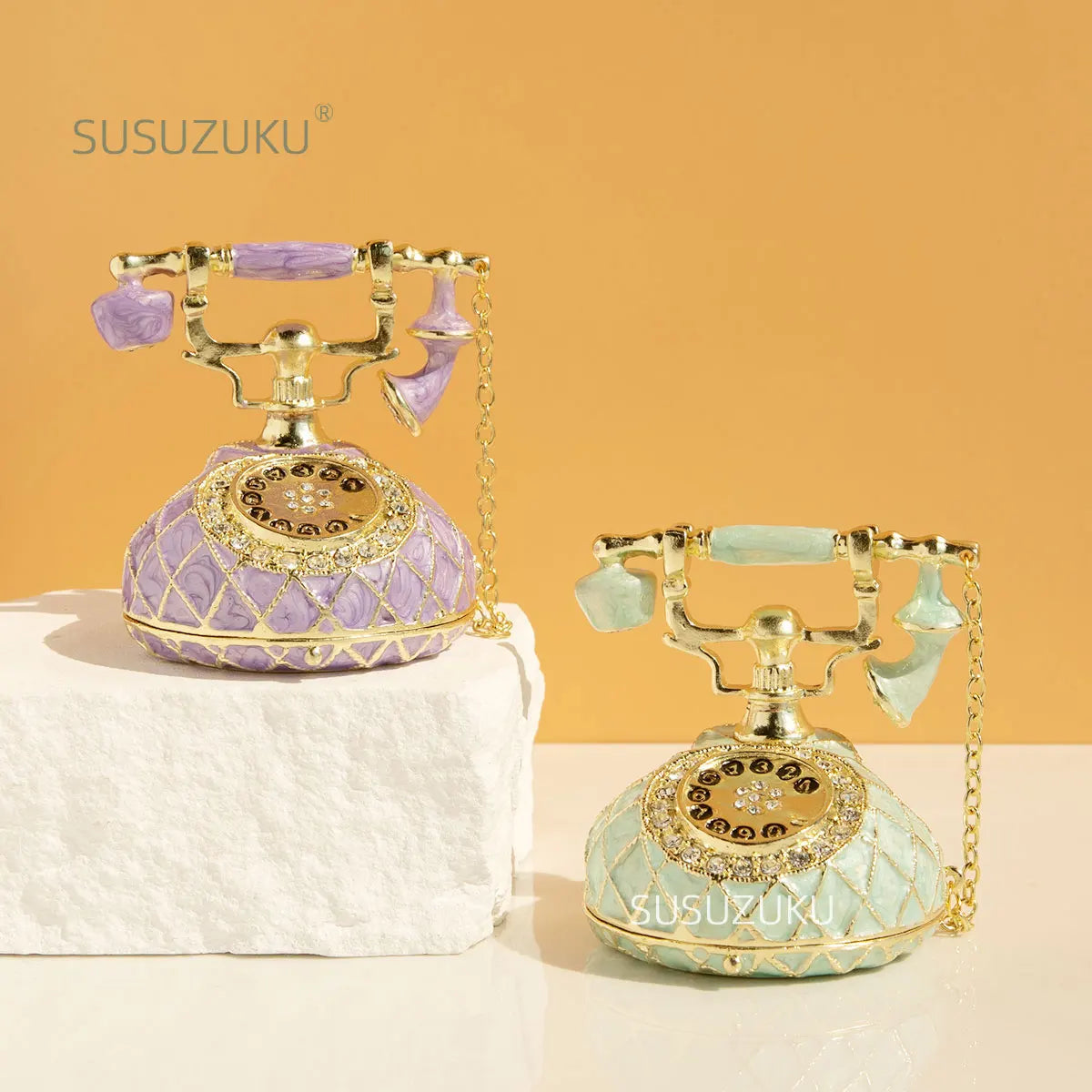 boîte bijoux téléphone vintage cuir géométrique violet vert clair élégant rétro chaîne dorée porte