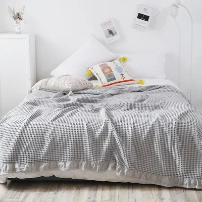 plaid coton doux solide rose clair tissage points moderne portable anti boulochage pique nique