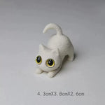 figurines chats miniature résine noir blanc yeux jaunes brillants cartoon mignon décoration erotiquecollector