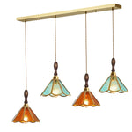 suspension lumineuse verre teinté art deco or marron bleu clair motifs géométriques opacité chaînes