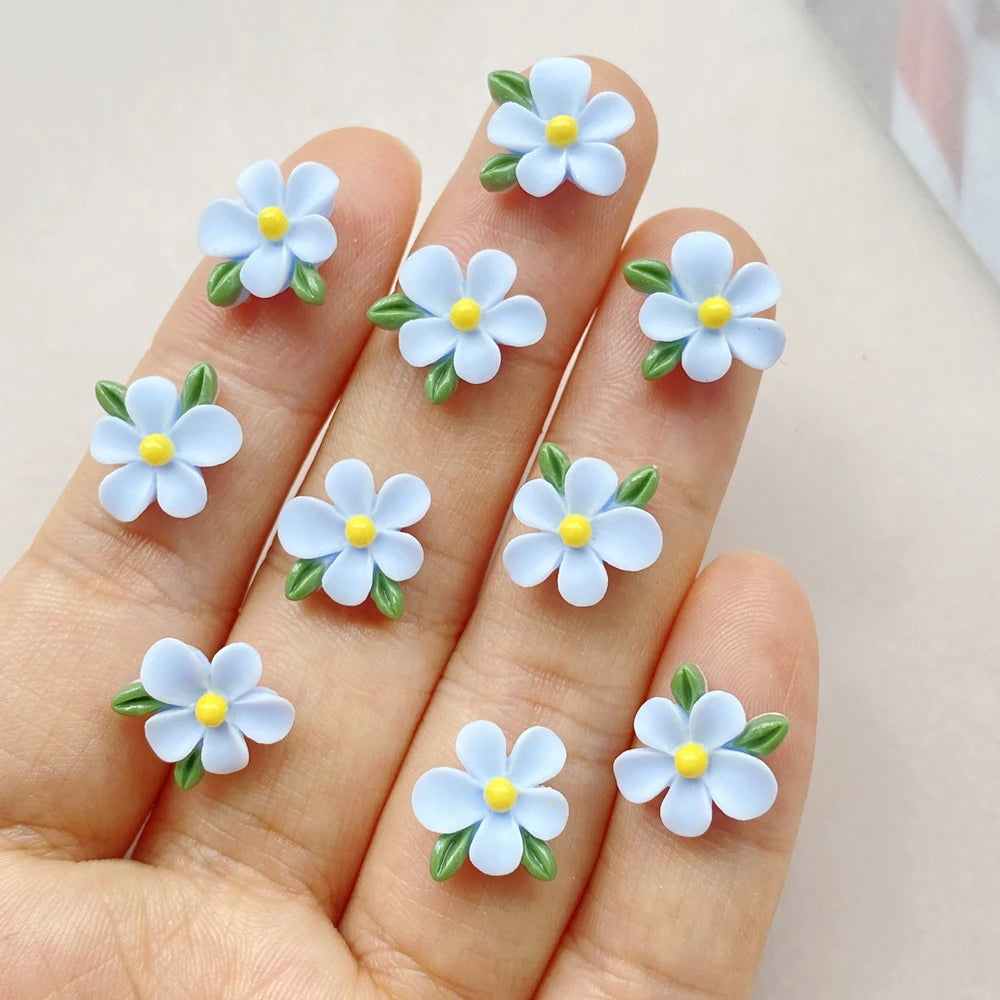 bijoux décoration ongles nail art fleurs colorées résine minimalistes blanc rose bleu vert jaune