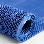tapis sol antidérapant pvc bleu rouge vert structure alvéolaire moderne géométrique