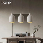 suspension lumineuse moderne beige clair texturée câble suspendu minimaliste lumière led