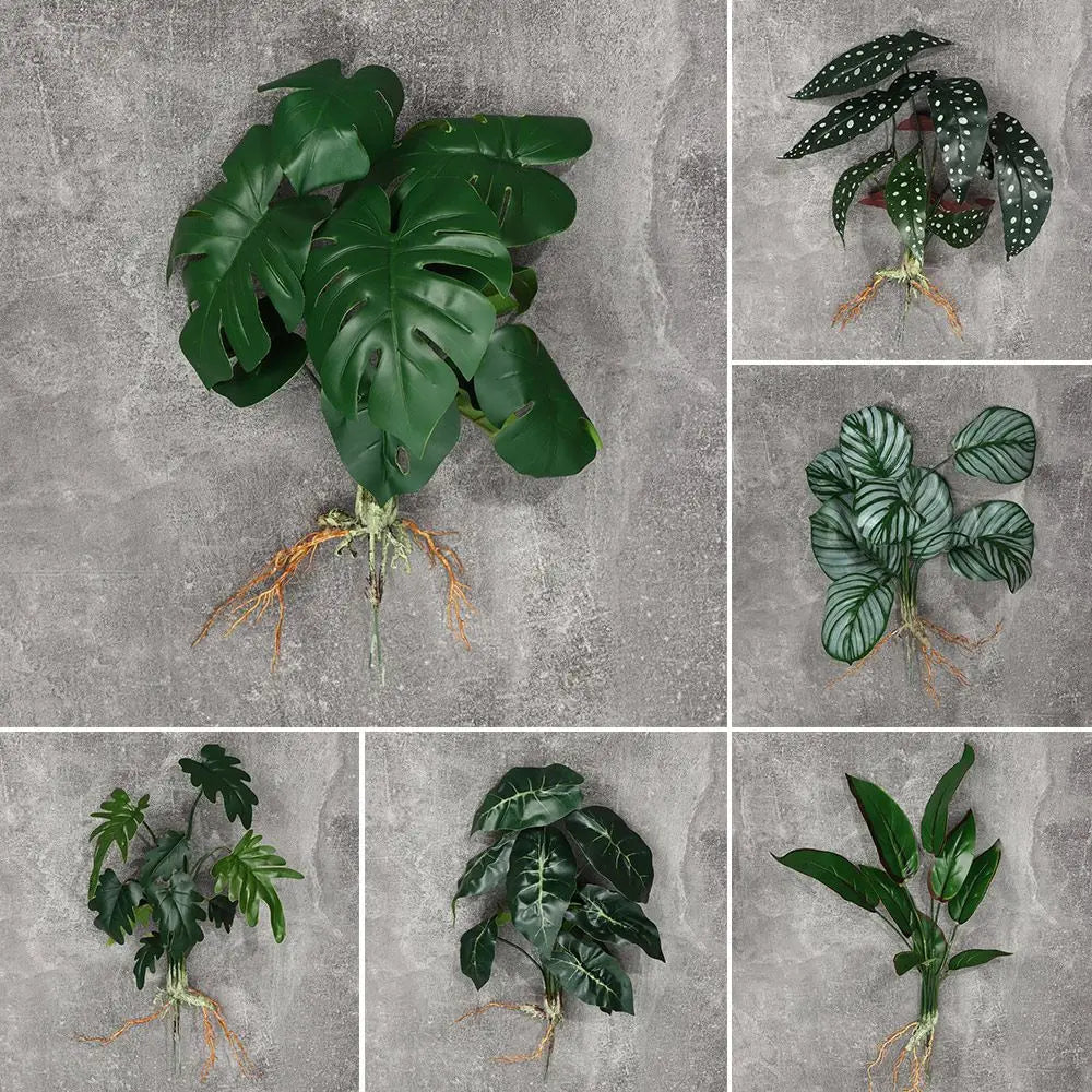 ornement décoration intérieure plante artificielle feuilles larges racines visibles vert foncé points blancs