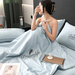 drap lit bleu clair broderie plumes bordure dorée moderne élégant coton doux maison