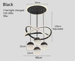 suspension lumineuse moderne or noir anneaux boules translucides led clips