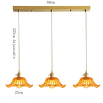 suspension lumineuse vintage transparente motifs floraux vert orange bleu