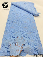 tissu dentelle bleu clair rose fleurs motifs floraux élégant dorées occasion partie
