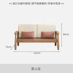 canapé places scandinave beige clair fauteuil pied poule moderne tapis géométrique terracotta blanc