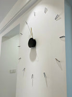 Horloge murale rouge rosé design moderne
