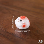 bol thé décoratif motifs fleurs pois rose blanc figurines porc céramique artisanal
