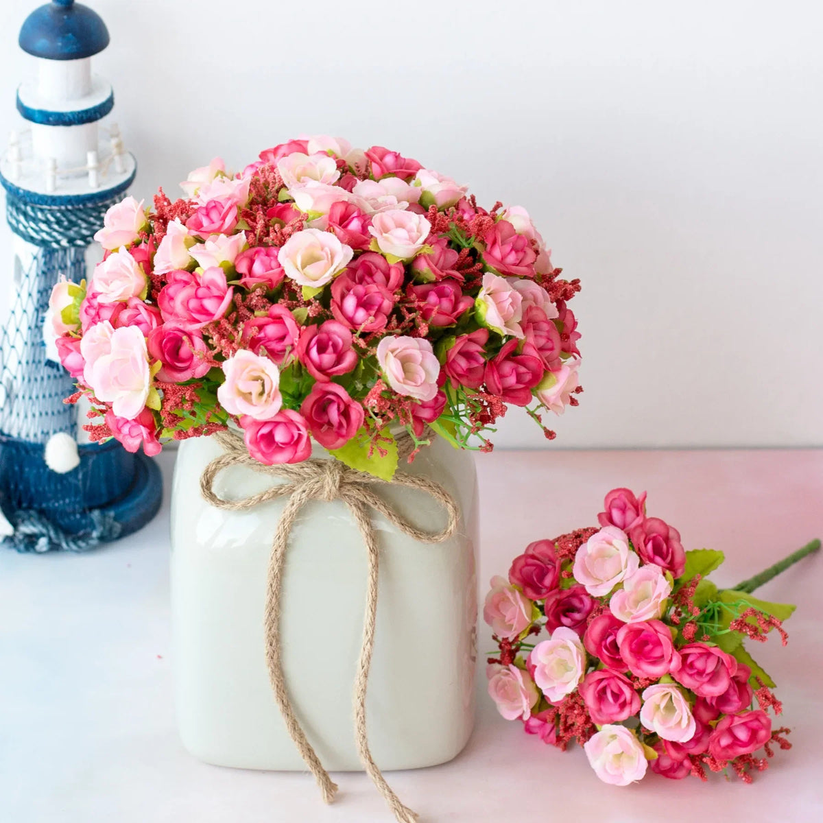 décoration intérieure rose vif fleurs artificielles bouquets champêtres vases lampion floral