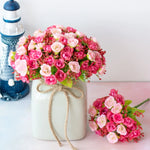décoration intérieure rose vif fleurs artificielles bouquets champêtres vases lampion floral